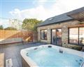 Enjoy your time in a Hot Tub at Vredehoek; Cornwall