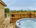 Enjoy your time in a Hot Tub at Wallace Lane Farm Cottages - Starling Lodge; Cumbria