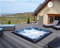 Relax in your Hot Tub with a glass of wine at West Horizon; Sutherland