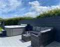 Relax in your Hot Tub with a glass of wine at White Towers; Caernarfon; Gwynedd