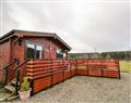 Relax in your Hot Tub with a glass of wine at Wildcat Lodge; ; Newtonmore