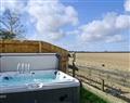 Relax in your Hot Tub with a glass of wine at Wolds View; Lincolnshire