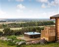 Relax in your Hot Tub with a glass of wine at Woodland Lodges - Ben Klibreck; Morayshire