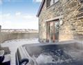 Relax in your Hot Tub with a glass of wine at Y Hen Beudy; Dyfed