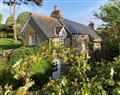Enjoy a glass of wine at Yew Tree Cottage; ; Stoke Fleming